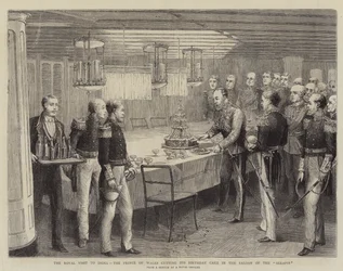 Der königliche Besuch in Indien, der Prinz von Wales schneidet seinen Geburtstagskuchen im Salon der Serapis an